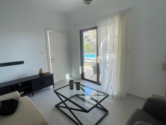 Turkish Title Deeded 2+1 Flat with Shared Pool and Ground Floor Garden in Villa Comfort in Yeni Boğaziçin