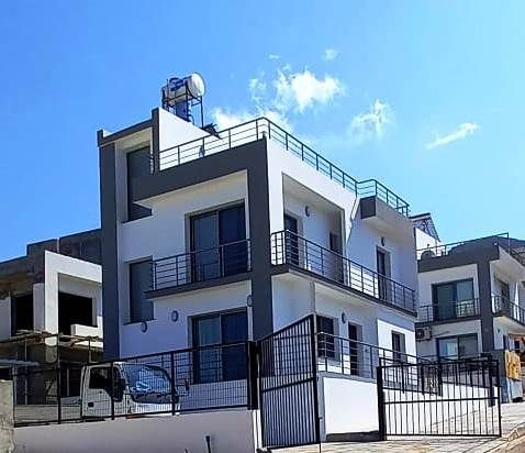 Girne-Çatalköy'de proje aşamasında 3 yatak odalı dubleks modern villalar  /içinde uygun fiyata daire alınır!!!!! / hakkında detaylı bilgiler için-05338334049 a ulaşınız.
