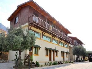 Girne-Lapta Bölgesi'nde  denize yürüme mesafesinde  çalışır durumda 40 odalı Tatil köyü - Butik hotelimiz hakkında -05338334049'a ulaşınız