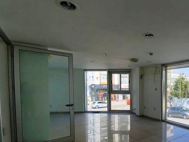 COMPLETE BUILDING SUITABLE FOR A BANK AND FINANCE OFFICE AND STORE ON THE STREET IN THE CENTER OF KYRENIA. ** 