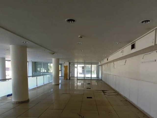 COMPLETE BUILDING SUITABLE FOR A BANK AND FINANCE OFFICE AND STORE ON THE STREET IN THE CENTER OF KYRENIA. ** 