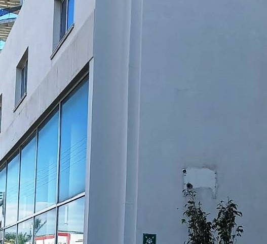 COMPLETE BUILDING SUITABLE FOR A BANK AND FINANCE OFFICE AND STORE ON THE STREET IN THE CENTER OF KYRENIA. ** 