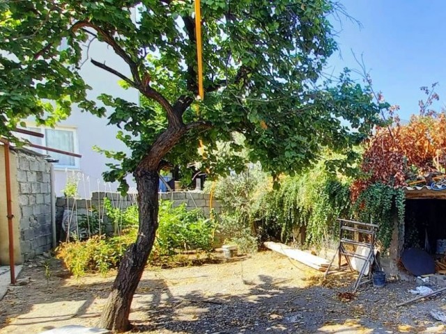 Kyrenia-Alsancak is a plot of land with 2 old houses in the village. Dec. ** 
