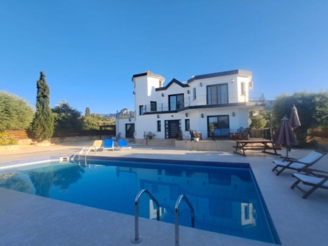 4-bedroom luxury villa with easy access to all needs in Çatalkoy, the popular region of Kyrenia.