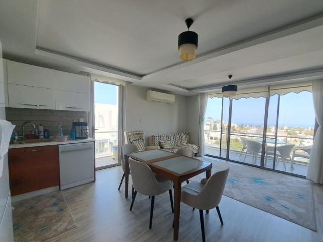 2-bedroom flat with panoramic view, heating system, furnished, Turkish title deed, terrace in the center of Kyrenia