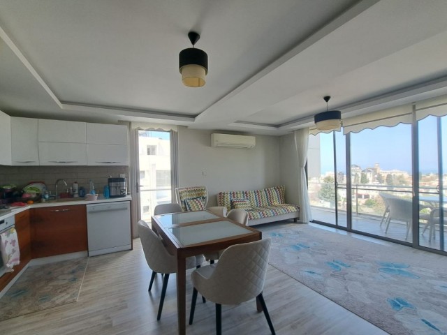 2-bedroom flat with panoramic view, heating system, furnished, Turkish title deed, terrace in the center of Kyrenia