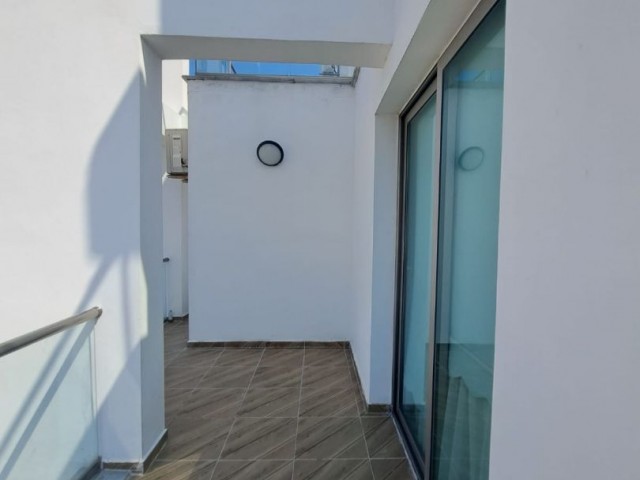2-bedroom flat with panoramic view, heating system, furnished, Turkish title deed, terrace in the center of Kyrenia