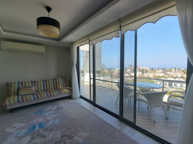 2-bedroom flat with panoramic view, heating system, furnished, Turkish title deed, terrace in the center of Kyrenia