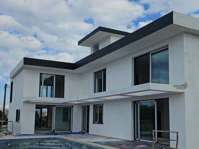 4+1 Moderne Villa mit Terrasse mit Aussicht und privatem Pool in der Gegend Girne-Ozanköy /Erdener Markt/, in der Fertigstellungsphase