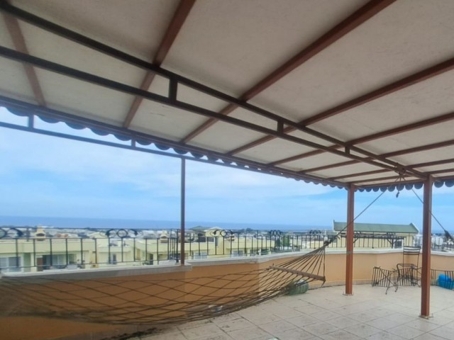 Spacious 3+1 flat with private terrace in a well-kept site with pool in Kyrenia-Alsancak.