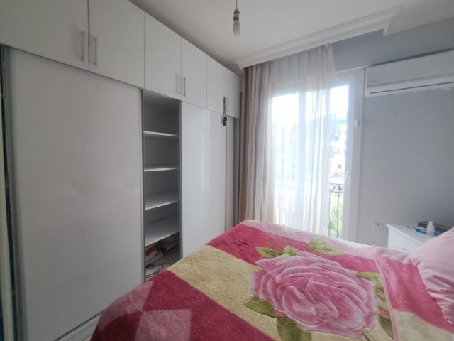 Spacious 3+1 flat with private terrace in a well-kept site with pool in Kyrenia-Alsancak.