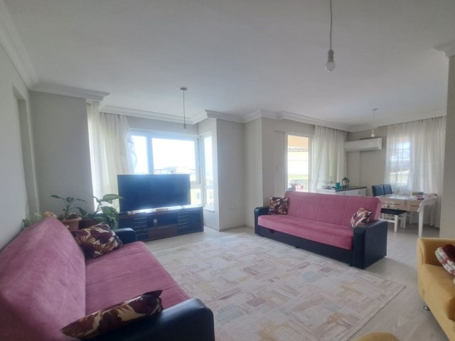 Spacious 3+1 flat with private terrace in a well-kept site with pool in Kyrenia-Alsancak.