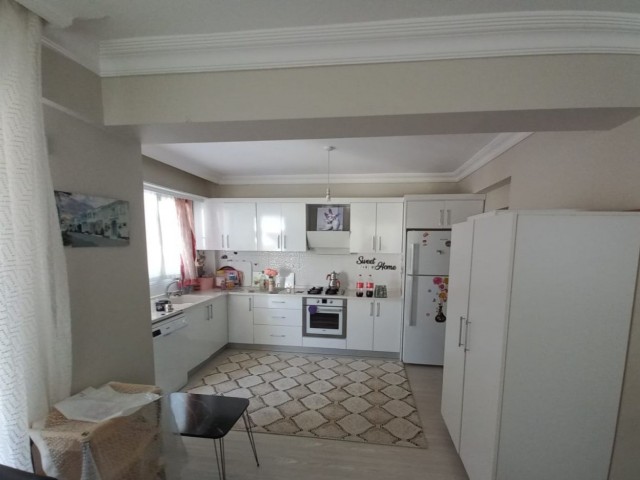 Spacious 3+1 flat with private terrace in a well-kept site with pool in Kyrenia-Alsancak.