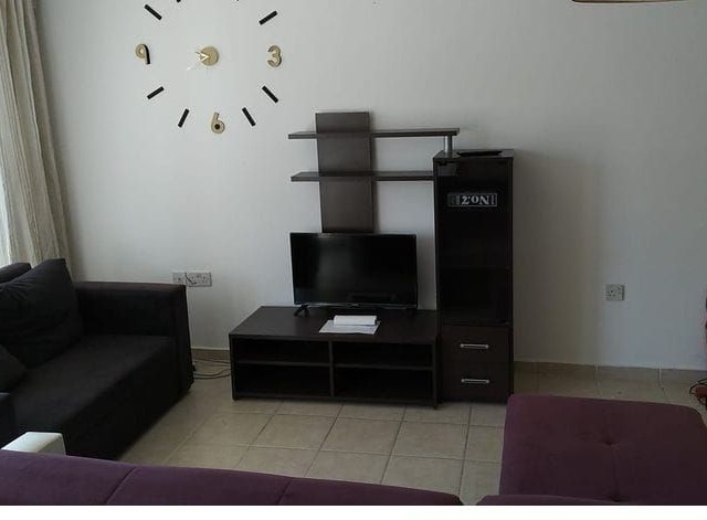 1+1 FLAT FOR SALE IN THE CENTER OF KYRENIA IN A SITE WITH POOL