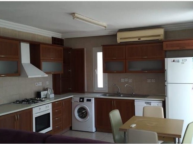 1+1 FLAT FOR SALE IN THE CENTER OF KYRENIA IN A SITE WITH POOL