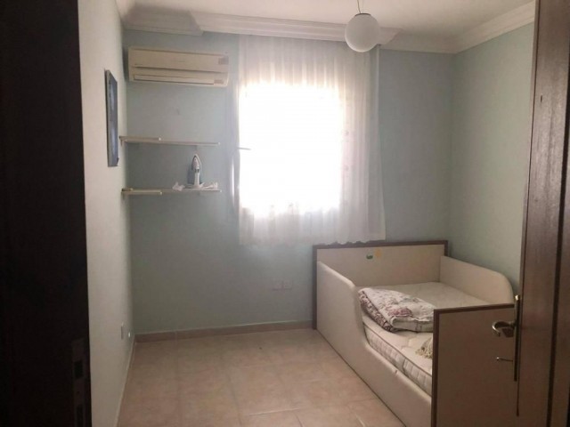 FULLY FURNISHED 3+1 FLAT FOR SALE IN GIRNE CENTER WITH POOL AND MAINTENANCED PATARA SITE