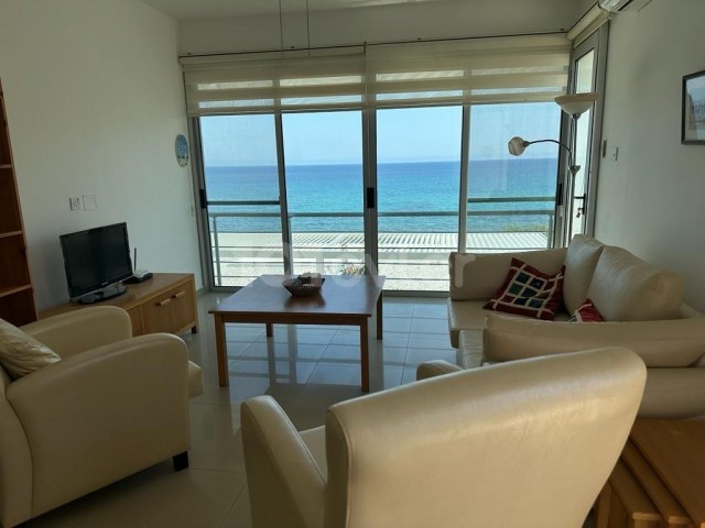 Seafront 2+1 80m2 fully furnished flat for sale in Karaoğlanoğlu