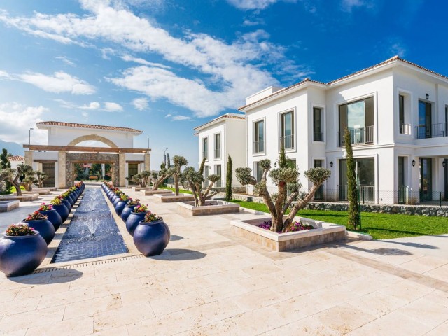 Kıbrıs town houses'da satılık zemin kat 2+1 90m2 daire 