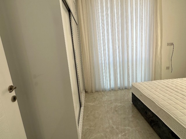 İskele Long beach de full lux eşyalı 2+1  sıfır kiralık daireler 