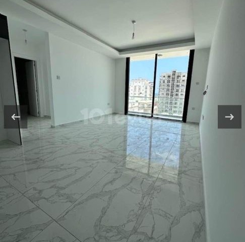 İskele long beach de siifr ,esyasiz ,kiralık 2+1 daire 