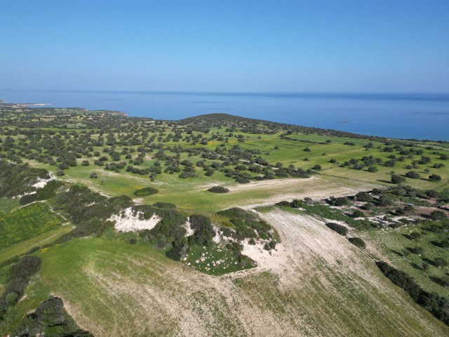 For sale in the village of Kaleburnu, 14 acres of Turkish cob land with sea and mountain views... ** 