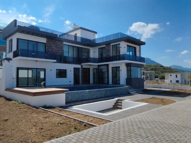 Unsere 800 m2 große 4+1-Villa mit Berg- und Meerblick in herrlicher Lage in der Region Kyrenia Zeytinlik steht zum Verkauf