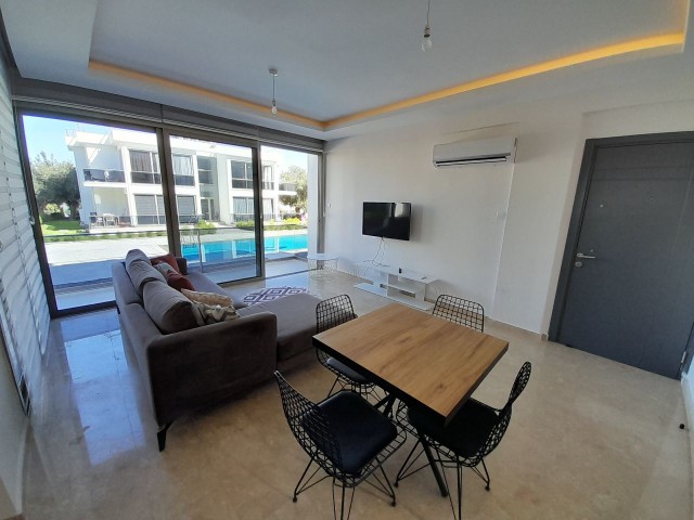 2+1, furnished garden floor with 100 m² garden, in Çatalköy, Kyrenia, in a complex with 2 swimming pools