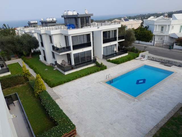 2+1, furnished garden floor with 100 m² garden, in Çatalköy, Kyrenia, in a complex with 2 swimming pools