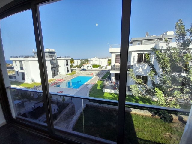 In a complex with 2 swimming pools, in Kyrenia Çatalköy, 90 m² Private Terrace, 2+1, Furnished 1st Floor