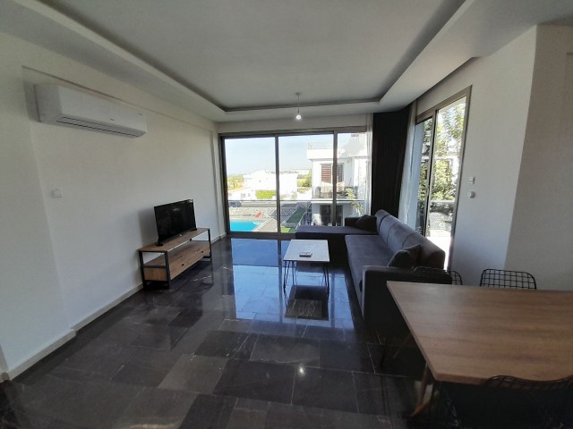 In a complex with 2 swimming pools, in Kyrenia Çatalköy, 90 m² Private Terrace, 2+1, Furnished 1st Floor