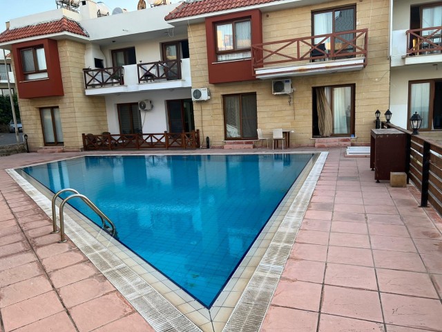 FULLY FURNISHED 3 + 1 APARTMENT WITH A BEACHFRONT POOL FOR SALE NEAR THE LORD PALACE HOTEL IN THE CENTER OF KYRENIA.. ** 