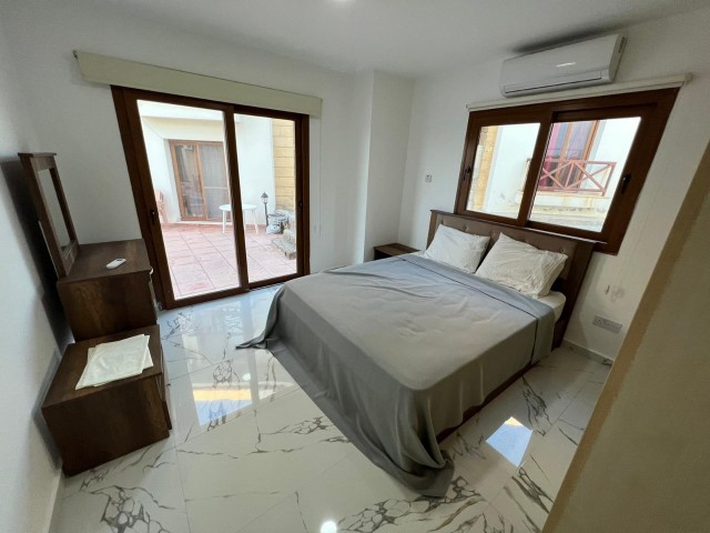 FULLY FURNISHED 3 + 1 APARTMENT WITH A BEACHFRONT POOL FOR SALE NEAR THE LORD PALACE HOTEL IN THE CENTER OF KYRENIA.. ** 