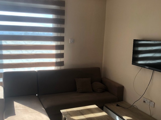 FULLY FURNISHED 2 + 1 APARTMENT FOR SALE IN WALKING DISTANCE FROM THE AMERICAN UNIVERSITY OF LEFKE.. ** 