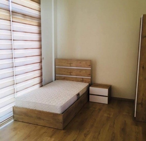 FULLY FURNISHED 2 + 1 APARTMENT FOR SALE IN WALKING DISTANCE FROM THE AMERICAN UNIVERSITY OF LEFKE.. ** 