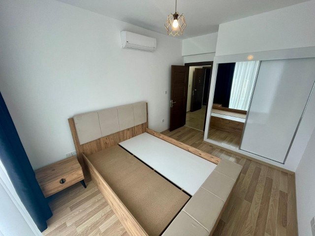 FOR THOSE LOOKING FOR A LOW FLOOR. .  FULLY FURNISHED LUXURIOUS 2+1 APARTMENT WITH ATTRACTIVE ADVANTAGES SUCH AS AIR CONDITIONING IN EVERY ROOM, LARGE SCREEN LCD TV, LAUNDRY ROOM, PARKING LOT, COMMUNAL POOL, WHICH EXHIBITS A UNIQUE BLUE AND GREEN VIEW TOGETHER, CLOSE TO THE CITY LIFE IN THE OLIVE GI