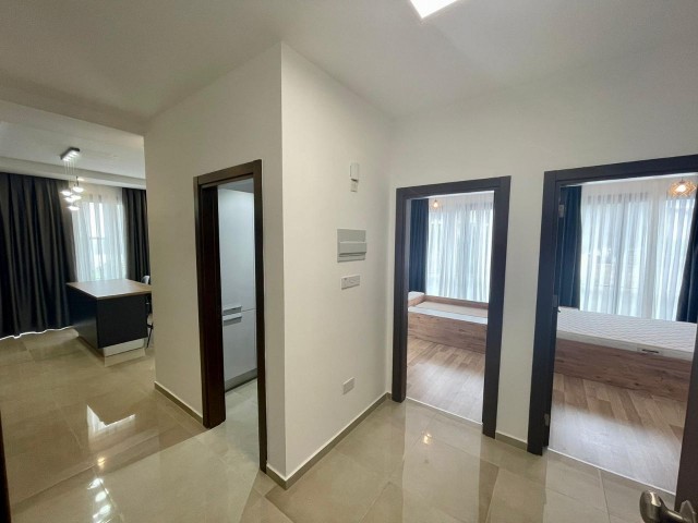 FOR THOSE LOOKING FOR A LOW FLOOR. .  FULLY FURNISHED LUXURIOUS 2+1 APARTMENT WITH ATTRACTIVE ADVANTAGES SUCH AS AIR CONDITIONING IN EVERY ROOM, LARGE SCREEN LCD TV, LAUNDRY ROOM, PARKING LOT, COMMUNAL POOL, WHICH EXHIBITS A UNIQUE BLUE AND GREEN VIEW TOGETHER, CLOSE TO THE CITY LIFE IN THE OLIVE GI