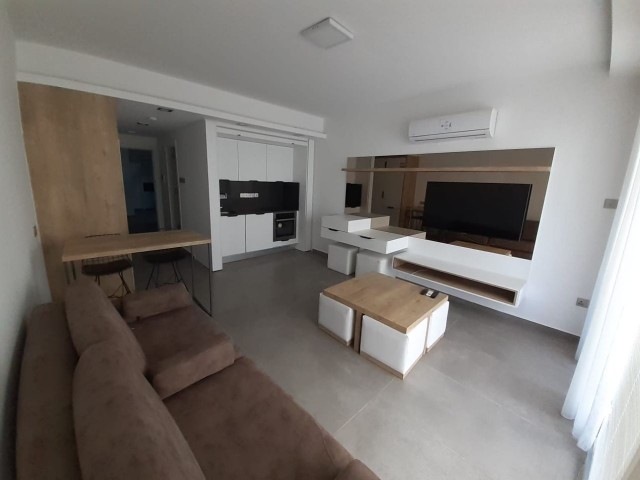 KUZEY KIBRIS,MAĞUSA,SAKARYA BÖLGESINDE KIRALIK 1+0 EŞYALI DAİRE