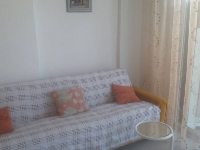  1 + 1 FLAT FOR SALE WITH COMMON POOL IN ALSANCAK