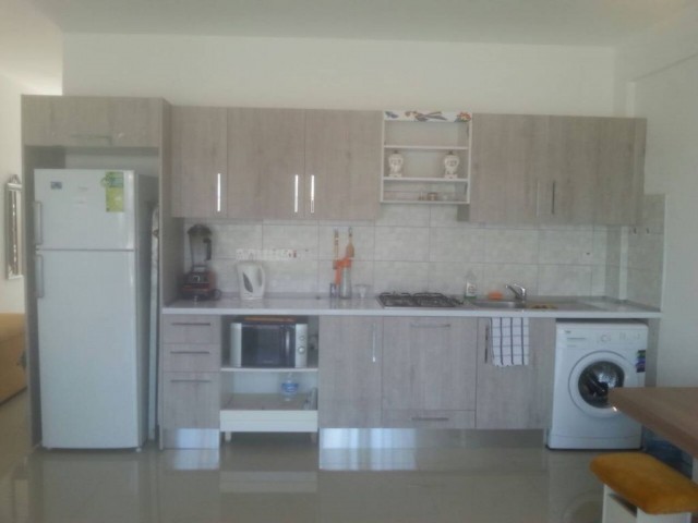  1 + 1 FLAT FOR SALE WITH COMMON POOL IN ALSANCAK