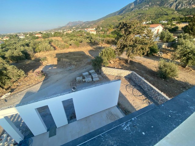 SEA VIEW VILLA FOR SALE IN KYRENIA WITH A SPECIAL LIVING AREA IN A LAND OF 4800M2