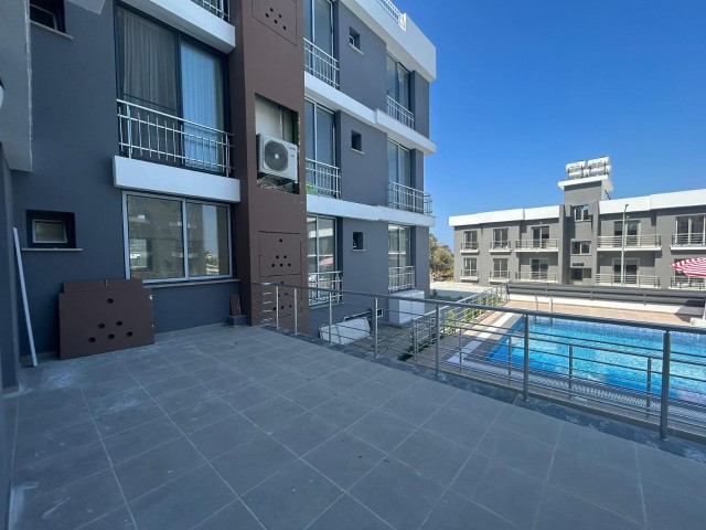 Сдается немеблированная квартира 2+1 с террасой в районе Кирения Алсанджак
