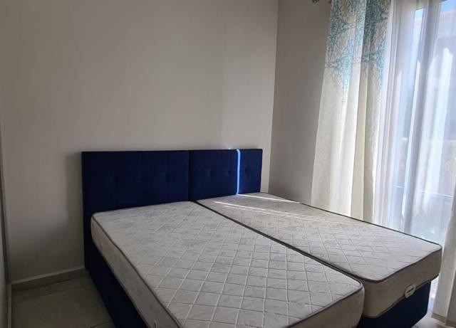 KIBRIS GİRNE ALSANCAK 2+1 KİRALIK DAİRE BAHÇELİ, ORTAK HAVUZLU VE GÜVENLİKLİ SİTEDE