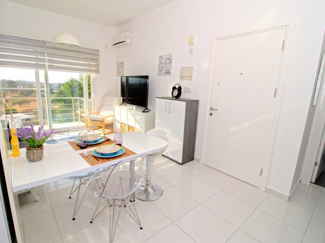 ALSANCAK ESCAPE HOMES SITE 1+1 FURNISHED APARTMENT FOR RENT, WITH SHARED POOL, CLOSE TO THE SEA ** 