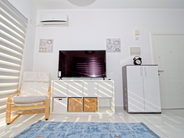 ALSANCAK ESCAPE HOMES SITE 1+1 FURNISHED APARTMENT FOR RENT, WITH SHARED POOL, CLOSE TO THE SEA ** 