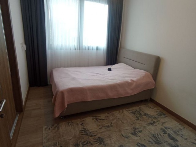 2+1 WOHNUNG ZU VERMIETEN MIT GARTEN UND GEMEINSCHAFTSPOOL IN BELLAVIEW-GELÄNDE IN BELLAPAİS, KYRENIA