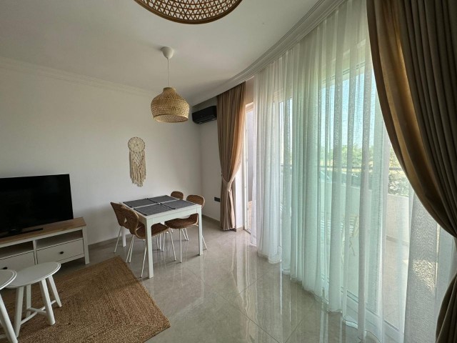 FLAT FOR SALE IN KKTC GIRNE KARAOĞLANOĞLUN WITH PRIVATE GARDEN AREA