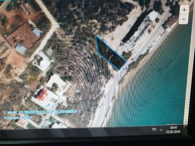 ZONED COMMERCIAL LAND WITH SEA FRONT AND HIGHWAY FRONTAGE