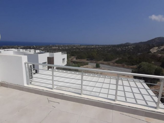 Unique opportunity in Tatlısu, within the site, 2-bedroom penthouse with mountain and sea views, 5 minutes from the sea.