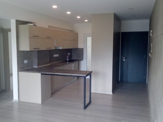 2+1 flat for sale in Yenikent area, with Turkish title