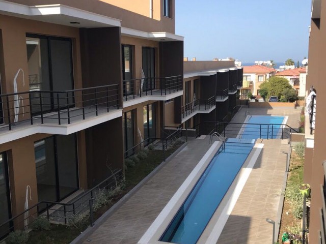 ZERO 2 +1 APARTMENT FOR SALE WITH MOUNTAIN AND SEA VIEWS WITH A TERRACE WITH A POOL 2 MINUTES FROM THE CENTER IN KYRENIA DOGANKOY.. ** 